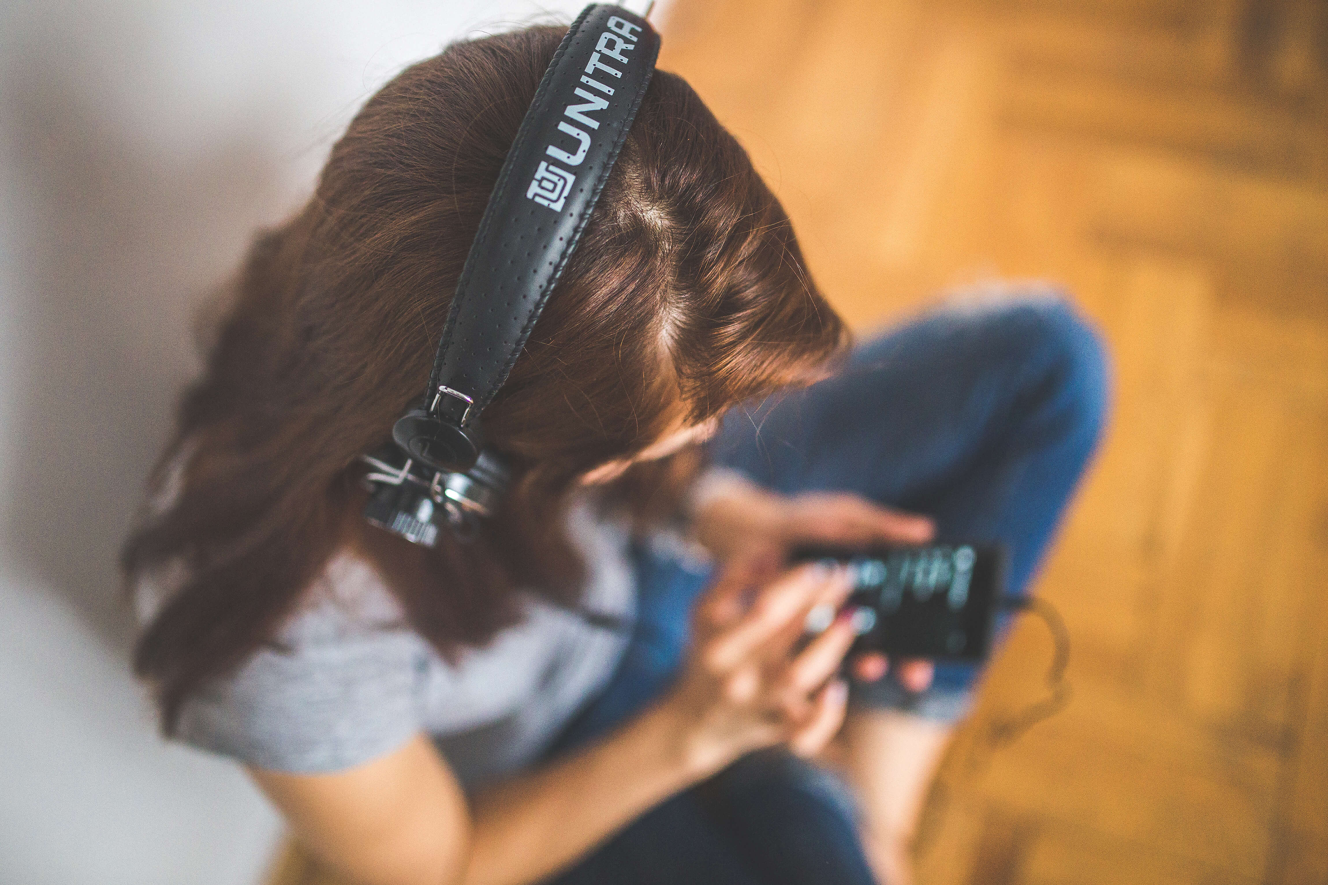 Woman Listening to Podcasts