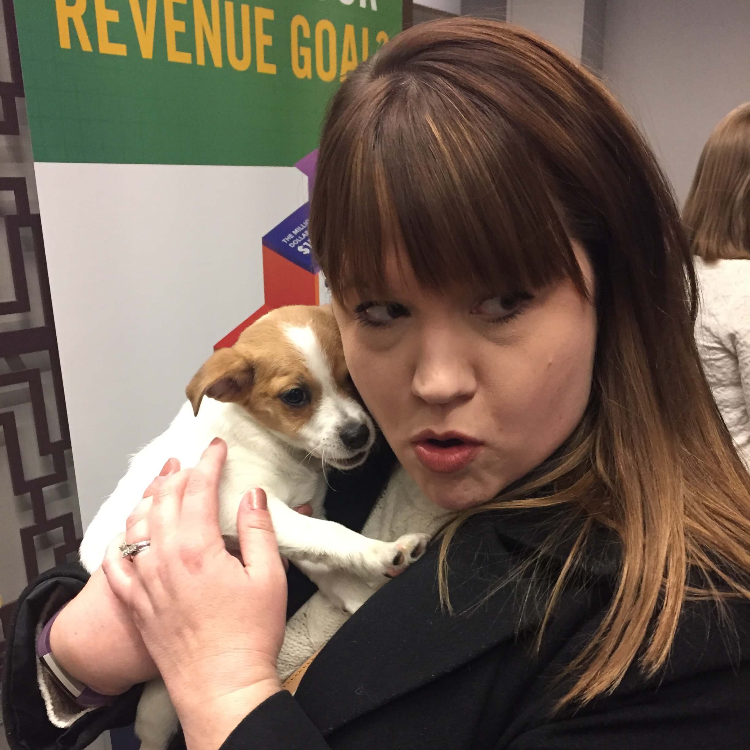 ABA Law Student Podcast host Sandy Gallant-Jones with a puppy.