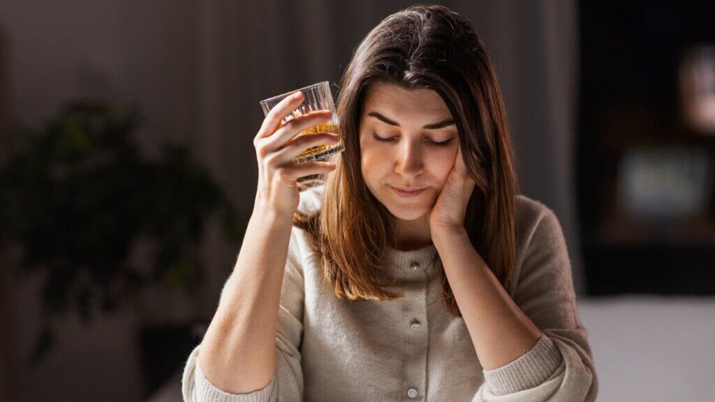 Woman holding a drink